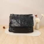 Black leather Niki Chain Flap bag with silver chain strap