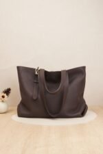 Louis Vuitton tote bag in burgundy color