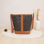 CELINE Small Bucket Bag in Triomphe Canvas with Calfskin Trim