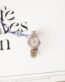 Hermès women's quartz watch with pink mother-of-pearl dial and diamond-set case back